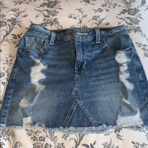 light denim skirt with holes